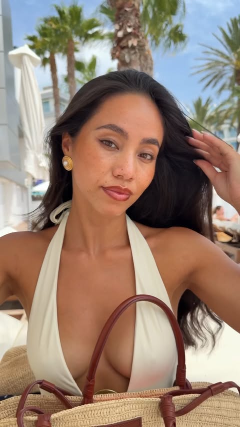 Instagram post by @ooliviaorza for Beauty Works Hair Extensions. Caption reads: What’s in my beach bag 🌞🌴🌺🌊 keeping my hair....