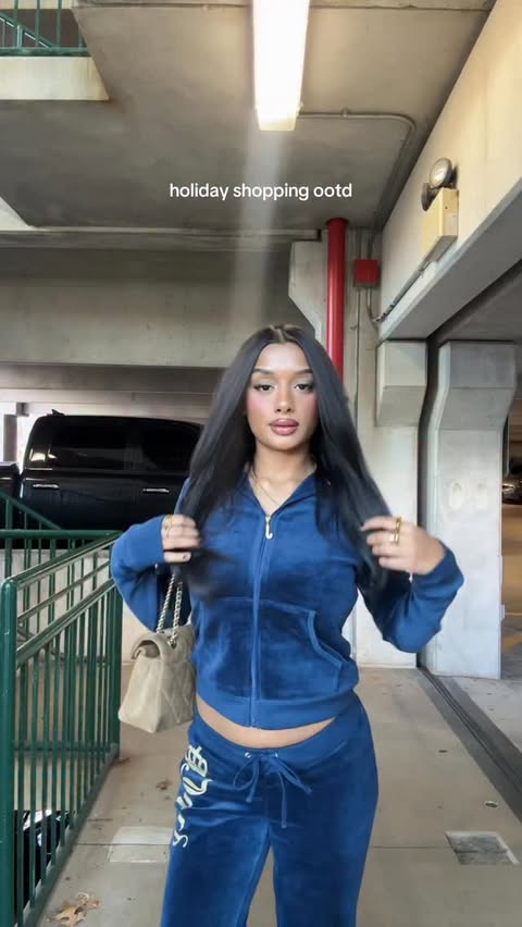 Instagram post by @arianadeshpande for Juicy Couture. Caption reads: in @juicycouture for the holidays 🤍✨ #ad....