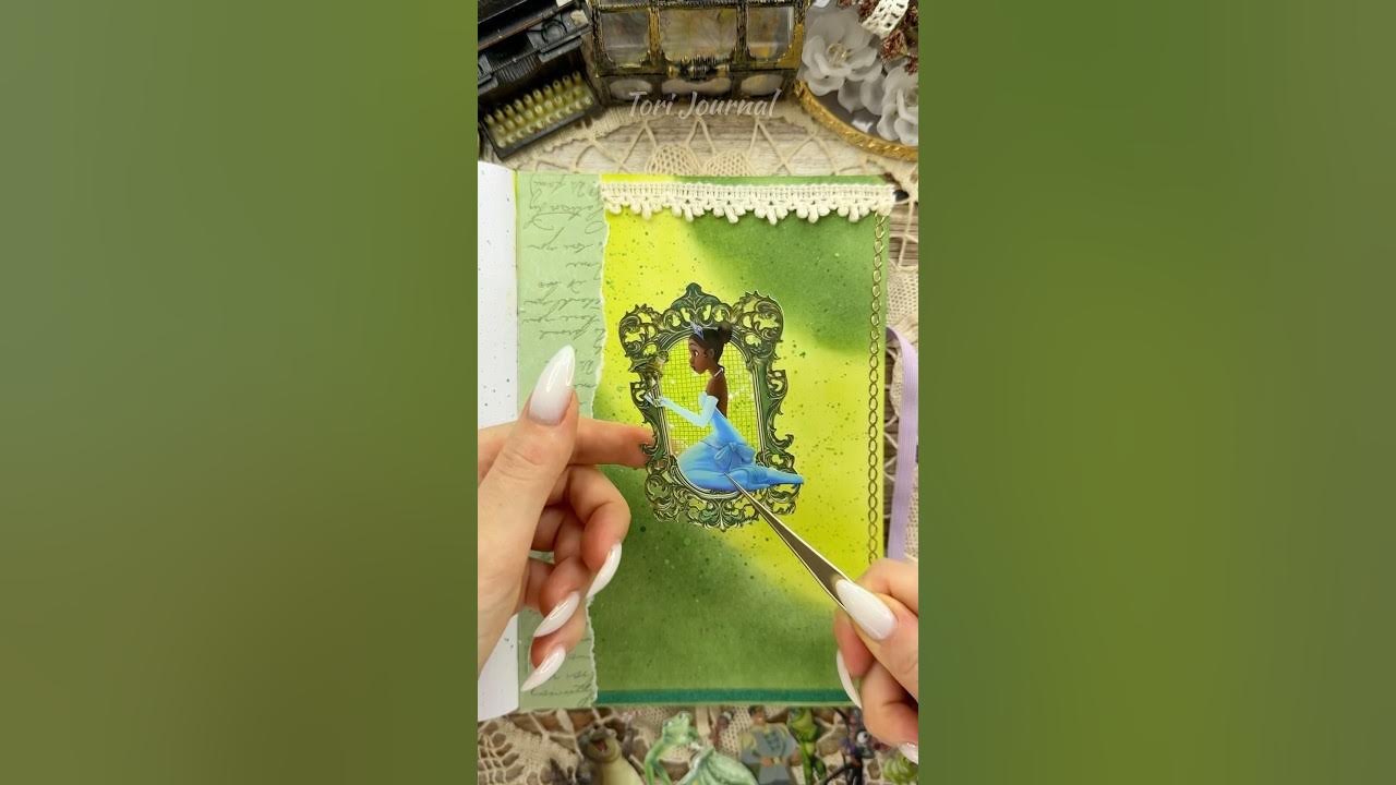 YouTube post by @ToriJournal for eStarCase. Caption reads: ASMR journal Tiana👑🐸💚✨|#asmr #journaling....