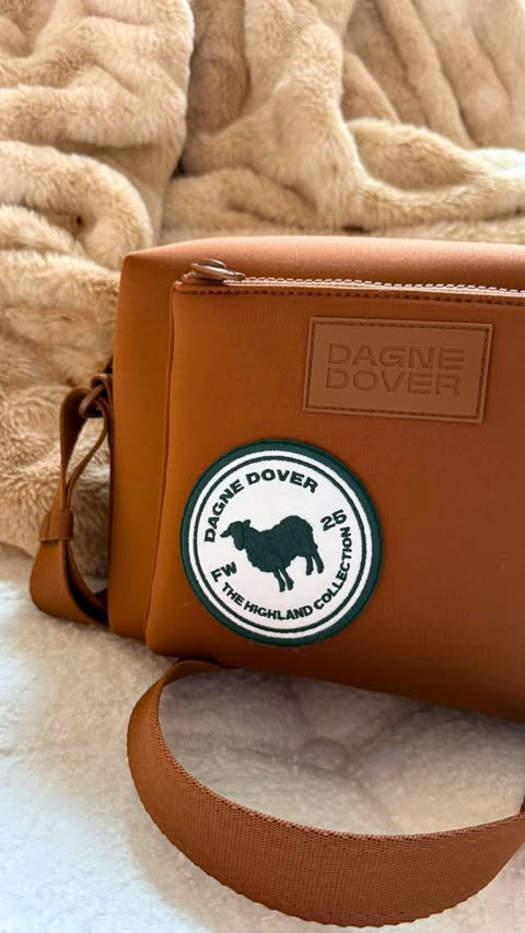 Instagram post by @jessydover for Dagne Dover. Caption reads: Meet your bag’s new best friend: our Highlands....