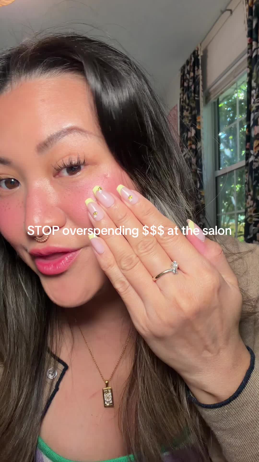 TikTok post by @sundarisocialhaus for Nailboo. Caption reads: Best decision of 2026 💅🏽 @Nailboo #nailinspo....