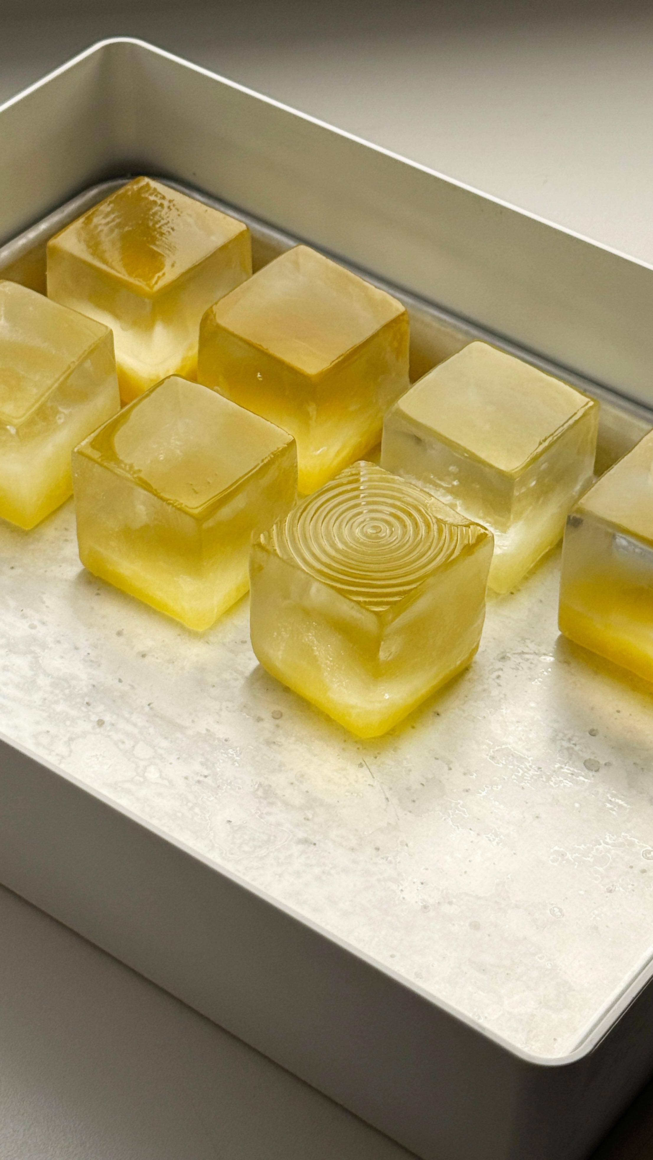 Instagram post by @discocubes for Herbivore. Caption reads: Brighten up with something new coming soon ✨🧊.