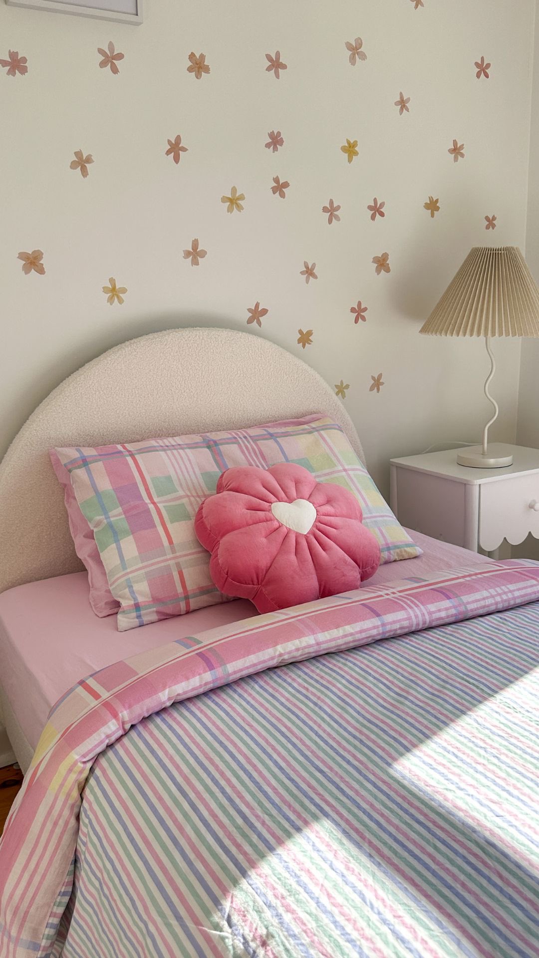 Instagram post by @caitlin.munyard for Adairs. Caption reads: Sweet pastels, two ways 🌸 The reversible Shelby....