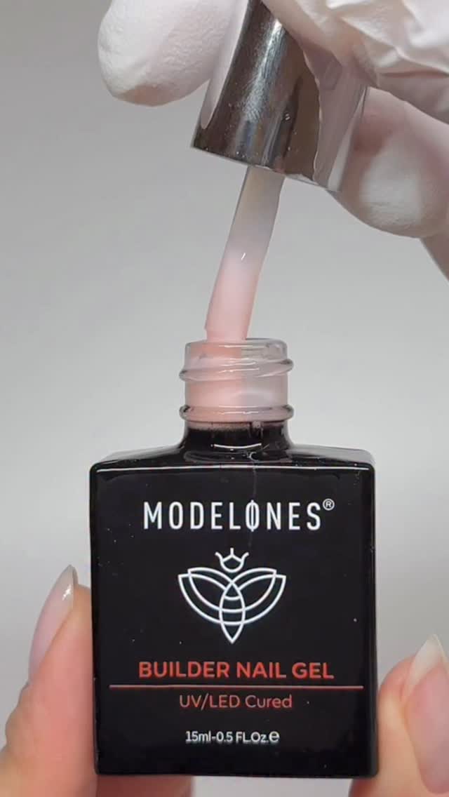 Instagram post by @bynatashad for Modelones. Caption reads: Nude nails 🤍🫧 by @modelones 

#nailinspo....