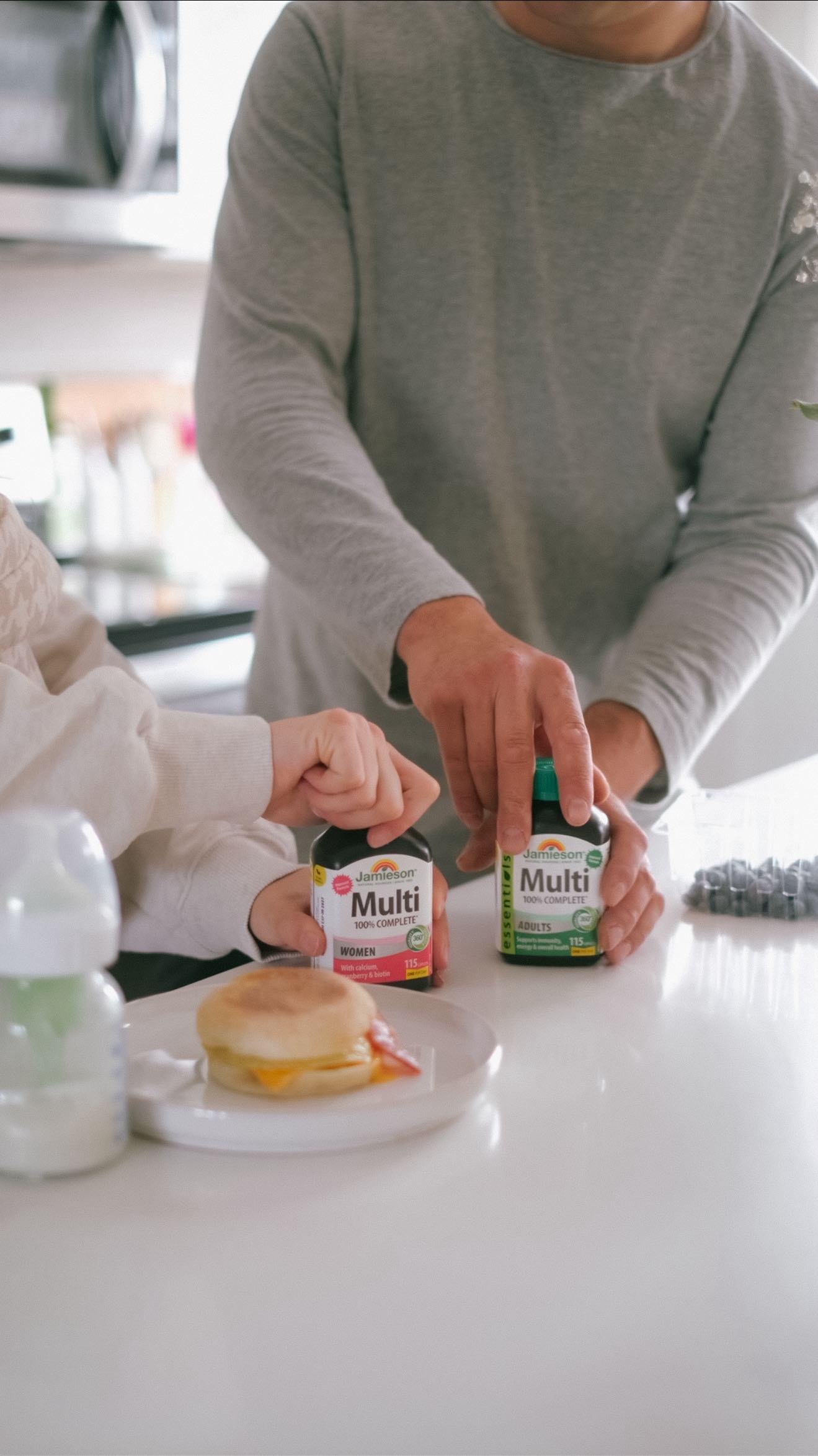 Instagram post by @mothermadeyou for Jamieson Vitamins. Caption reads: Oh hey baby Lemmie 😂. The olders are off to....