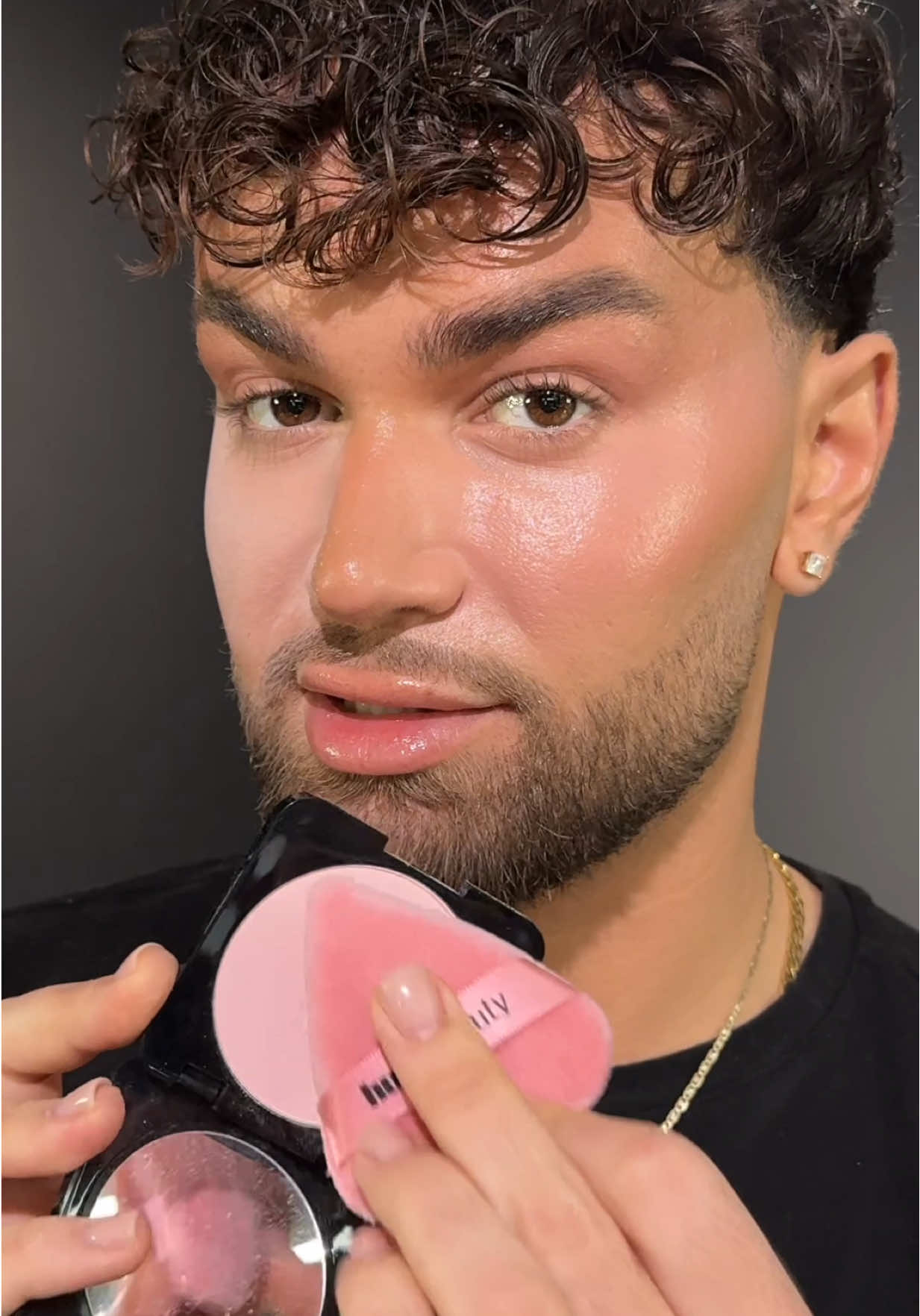 TikTok post by @kevikodra for Huda Beauty. Caption reads: [...] for a FLAWLESS undereye with the @Huda....