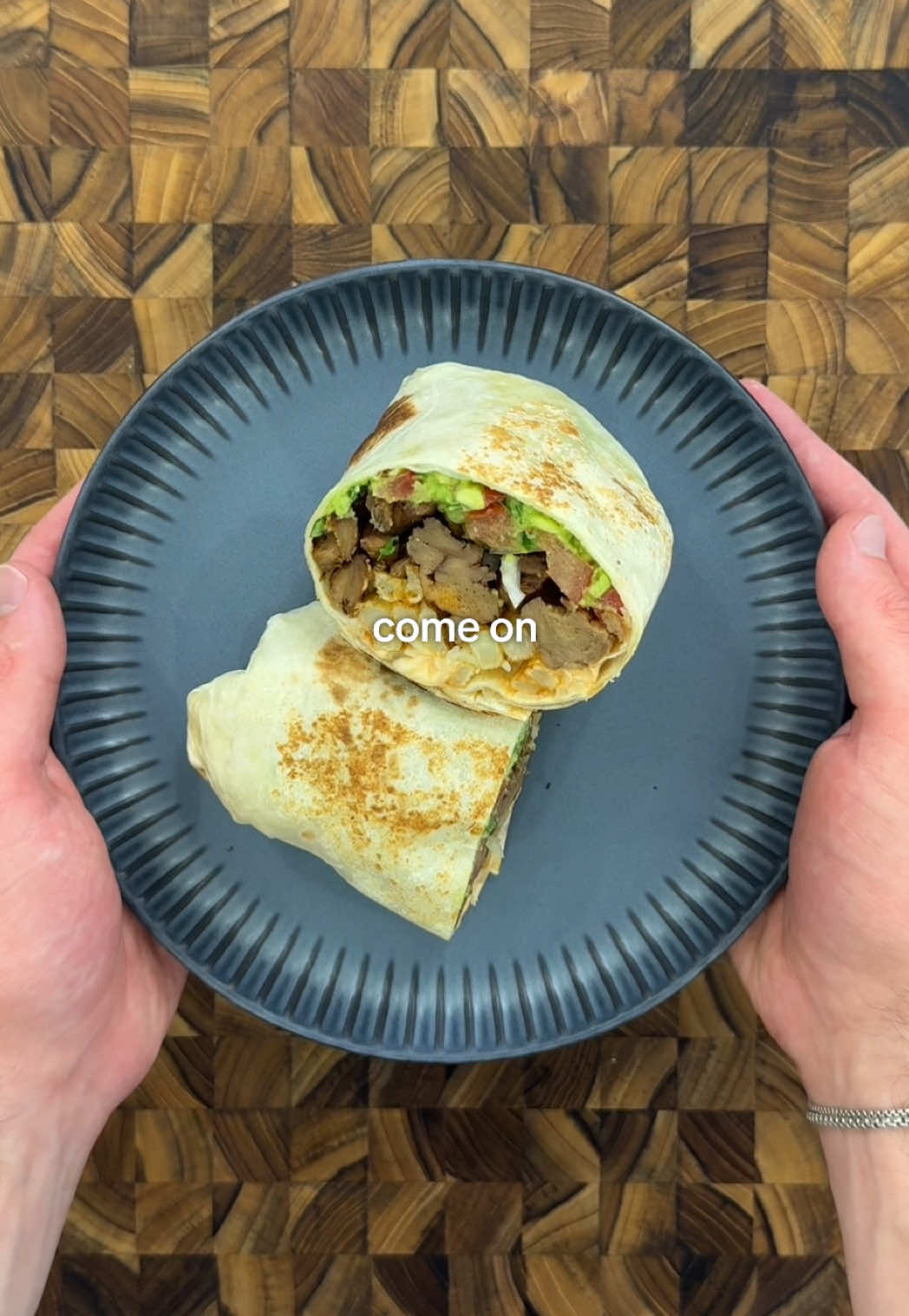 TikTok post by @_samjose_ for Impossible Foods. Caption reads: [...] burrito made from plants 🌱@Impossible Foods....