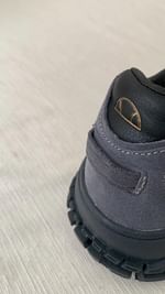 Instagram post by @pamzokuhle for ellesse. Caption reads: Unboxing the new LSR Ellesse 🌪️.