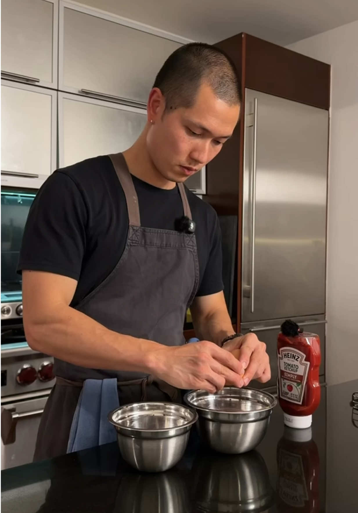 TikTok post by @madebymusashi for Heinz. Caption reads: should I try omurice with @heinz next?? Either way....