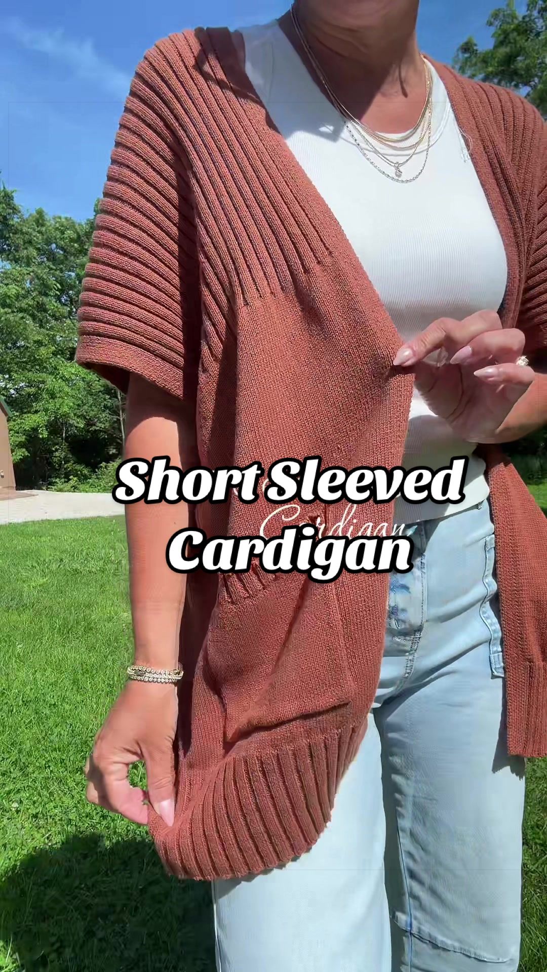 TikTok post by @julie_trimble for Shewin Official US. Caption reads: Perfect layering piece year round, open front....