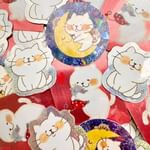 Instagram post by @t0m0116 for StickerApp. Caption reads: 【PR】StickerApp様とのコラボ企画でニコのステッカーを制作しました！

とってもキレイな仕....