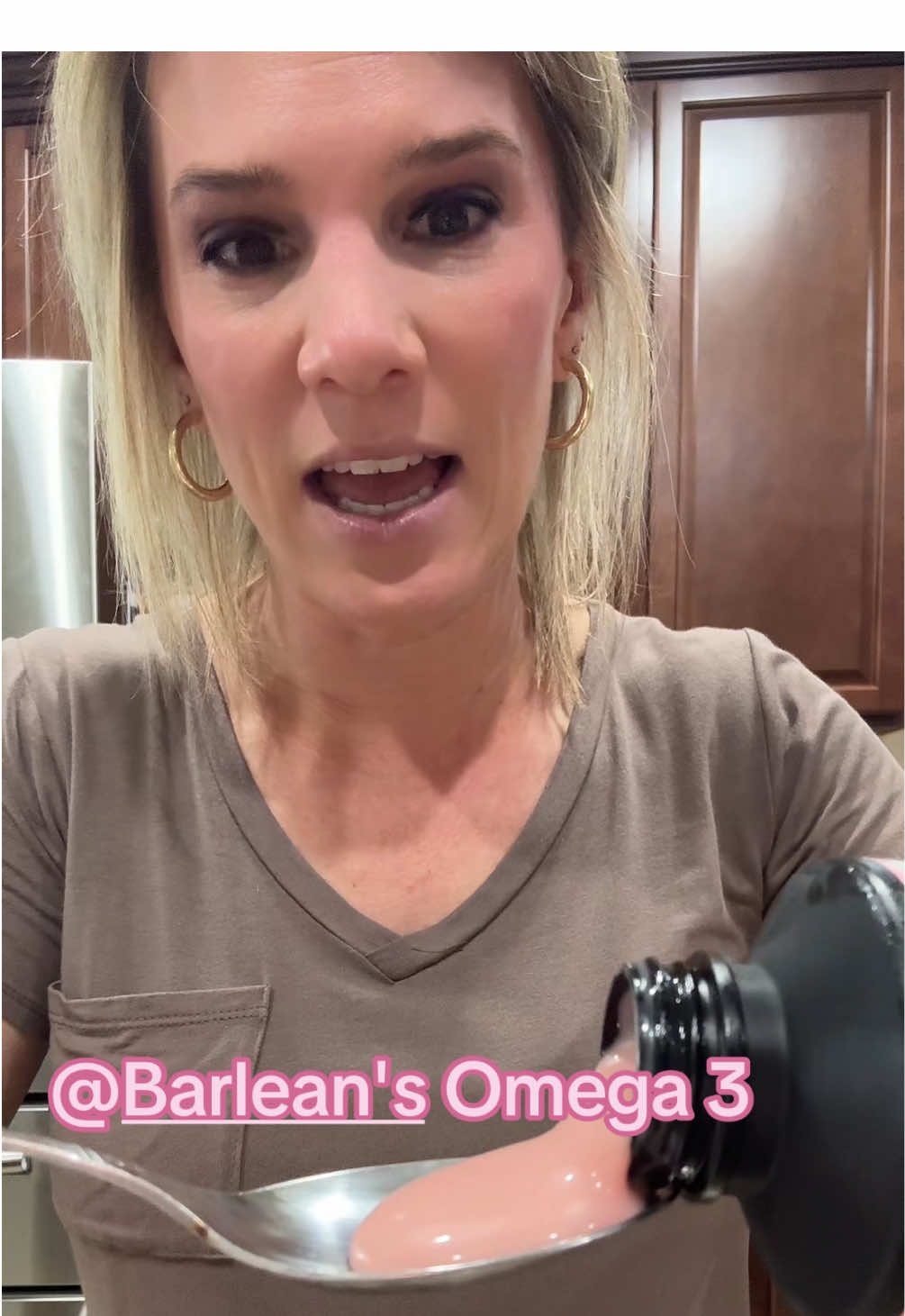 TikTok post by @thamillsfam for Barlean's. Caption reads: [...] scoop you up a bottle. So very tasty.....