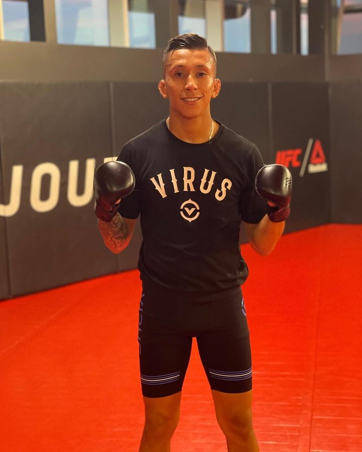 Instagram post by @jmolina_125 for VIRUS. Caption reads: [...] #chasingdreams #UFC #VIRUSINTL #GloryMMA....