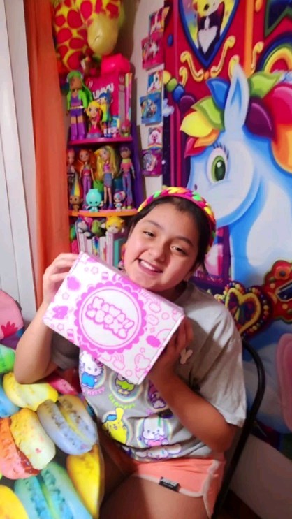 Instagram post by @therainbowfamilyfun for Kawaii Box. Caption reads: Let's unbox April @kawaiibox !! 🩷🩷🩷 Get $5 off....