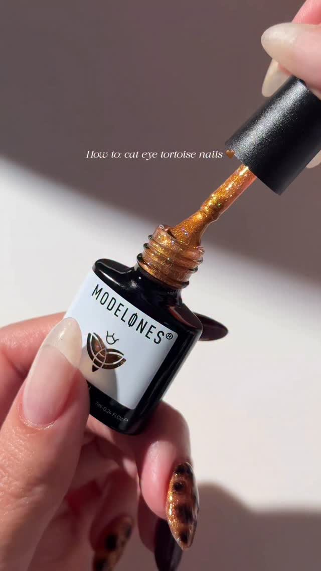 Instagram post by @kuypernailart for Modelones. Caption reads: [...] + torties 🤎
*ad*

All polishes are from the....