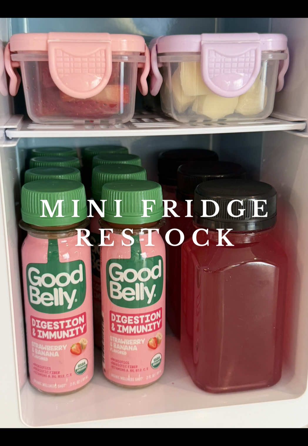TikTok post by @kate_cleanhome for Whole Foods Market. Caption reads: Mini fridge restock for my girl 🌸🥰🩷 GoodBelly....