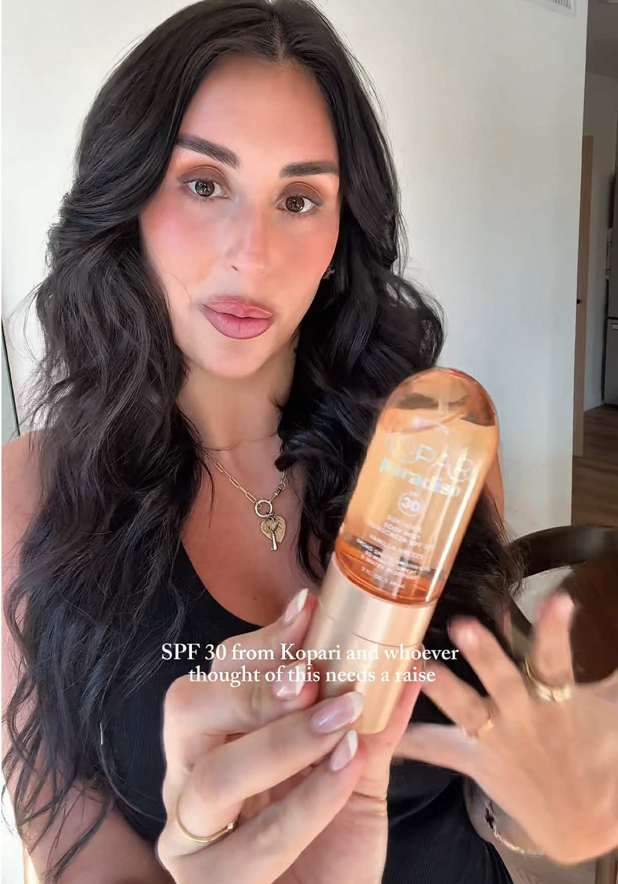 TikTok post by @carolinemstern for Kopari Beauty. Caption reads: [...] immediately. New body mists with spf 30 from....