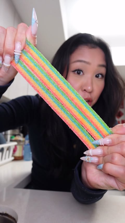 Instagram post by @justpearlm for 7-ELEVEN. Caption reads: [...] in Xtreme Town? Scan the QR code at @7eleven....