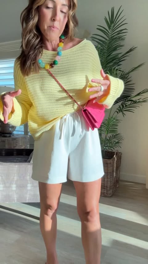 Instagram post by @twopeasinablog for American Eagle. Caption reads: Comment SHOP so you don’t miss this sweater! / No....