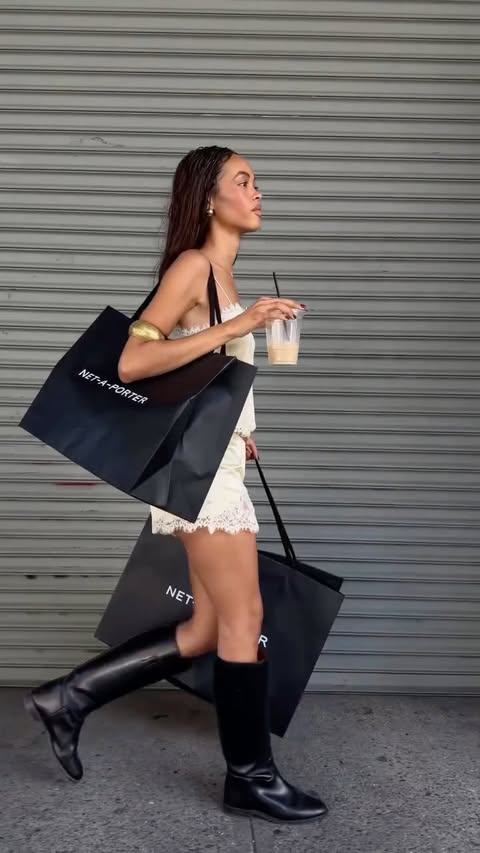 Instagram post by @cristinacheni for NET-A-PORTER. Caption reads: [...] as I move through the city. @netaporter....