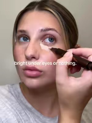 TikTok post by @tylermichelleee for LIVE TINTED. Caption reads: gifted by Live Tinted 🧡 @Live Tinted #concealer....