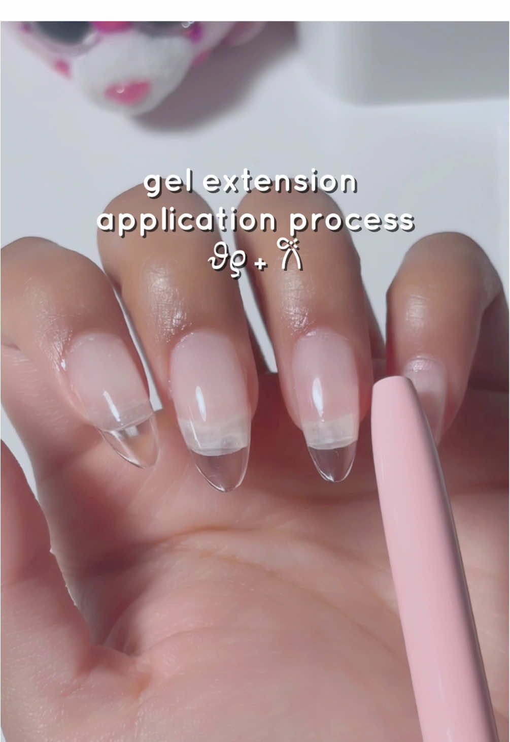 TikTok post by @orangeflowernail for BeetlesGelPolish. Caption reads: apply gel extensions with me ✨💅🎧 using: ....