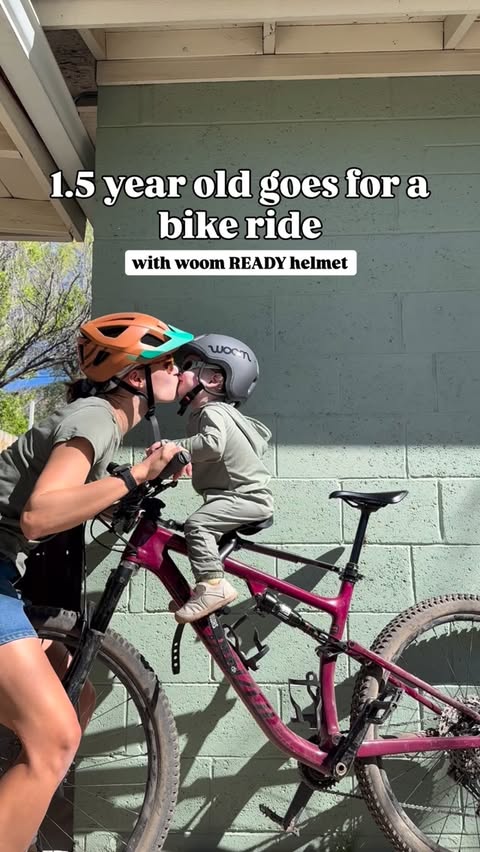 Instagram post by @themountain_mama for woom. Caption reads: [...] memories live outside 💛 Helmet is by....