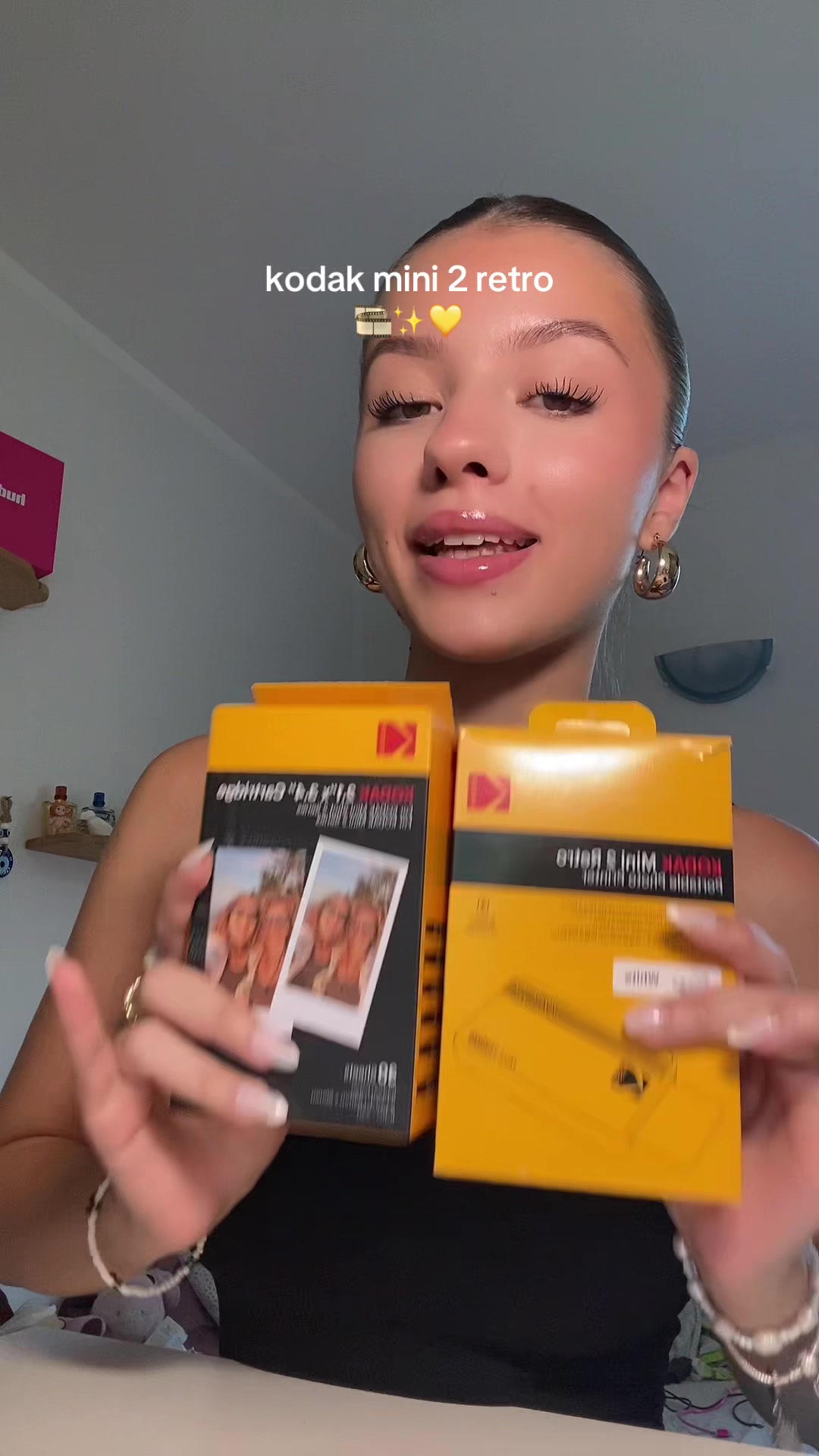 TikTok post by @juliacrippaa for Kodak Photo Printer. Caption reads: Kodak mini 2 retro💛 @Kodak Photo Printer  Promo....