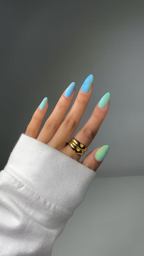 Instagram post by @glossytipped for Beetles Gel Polish. Caption reads: [...] summery sea glass mani 🐬🌊 using....