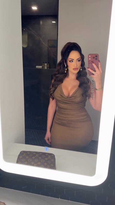 Instagram post by @vanessa.fnp for JLUXLABEL. Caption reads: A moment for the dress ✨ @jluxlabel #houston....