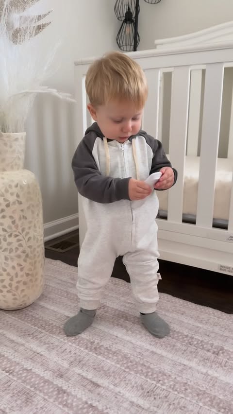 Instagram post by @raisa.oshurko for MiniOlie. Caption reads: Beautiful baby romper, with a zipper, which makes....