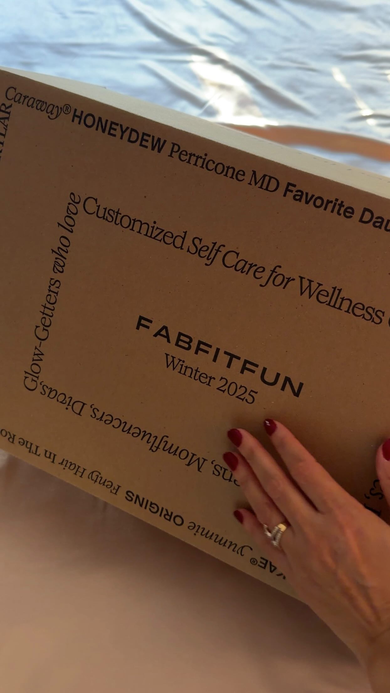 Instagram post by @reemakakria9 for FabFitFun. Caption reads: Unboxing my winter FabFitFun box✨
It’s packed with....