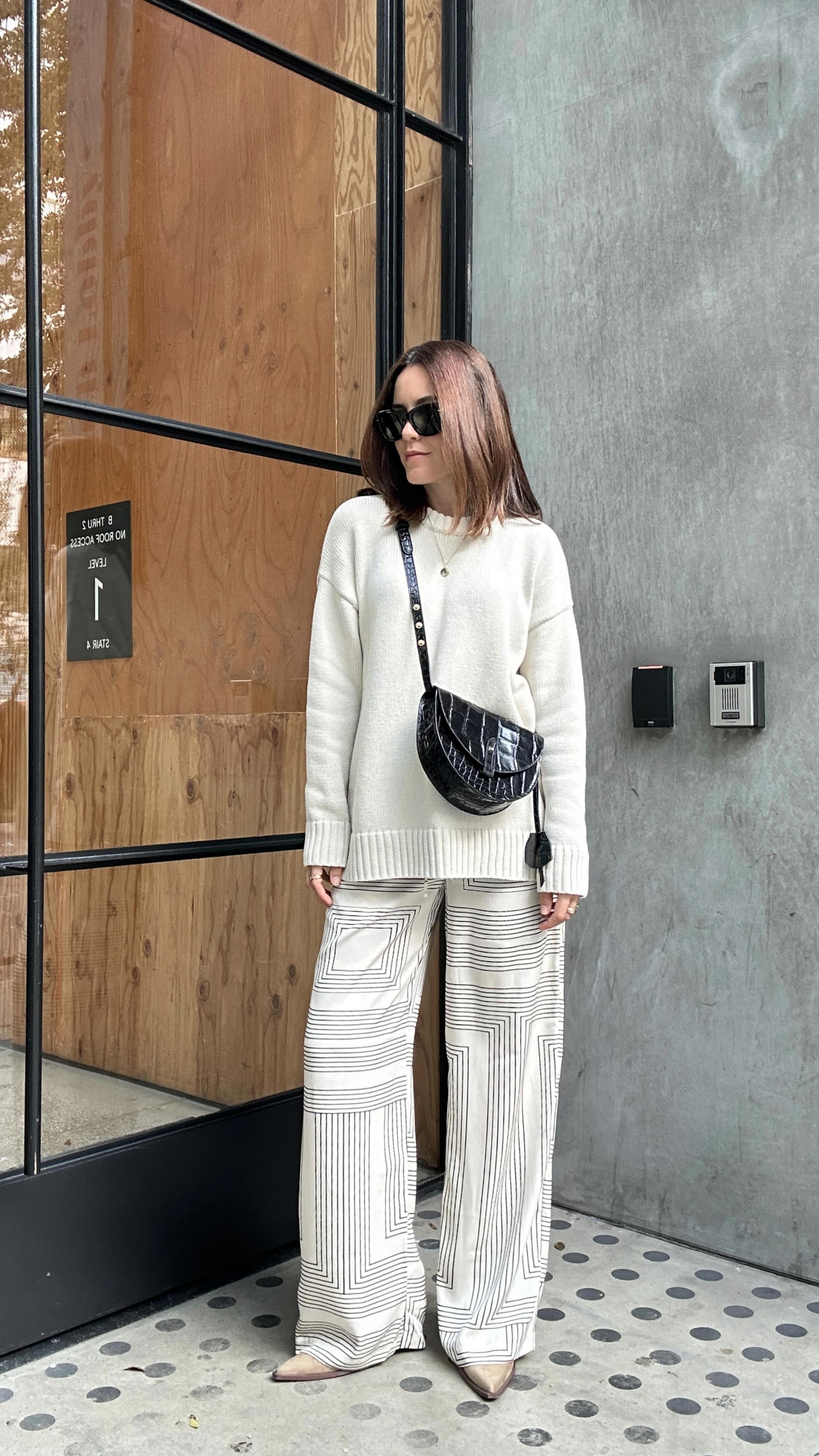 Instagram post by @karla_jordan3 for Eric Javits. Caption reads: My kind of bag, chic and timeless @ericjavits Use....