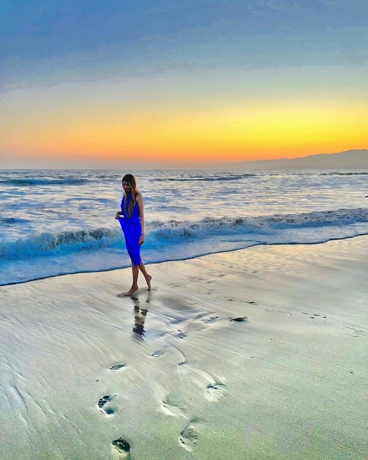Instagram post by @amber_tar for SILK MAISON. Caption reads: [...] summertime sunsets 🫶🏻🌊// wearing....