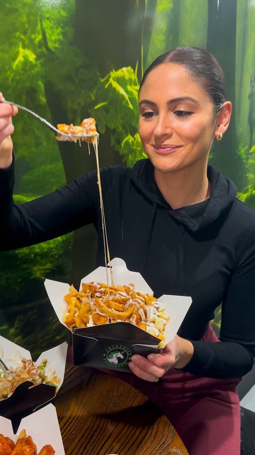 Instagram post by @outwithlauren for Toronto Life. Caption reads: ✨GIVEAWAY✨ Win 2 Toronto Raptors tickets 🏀 and a....