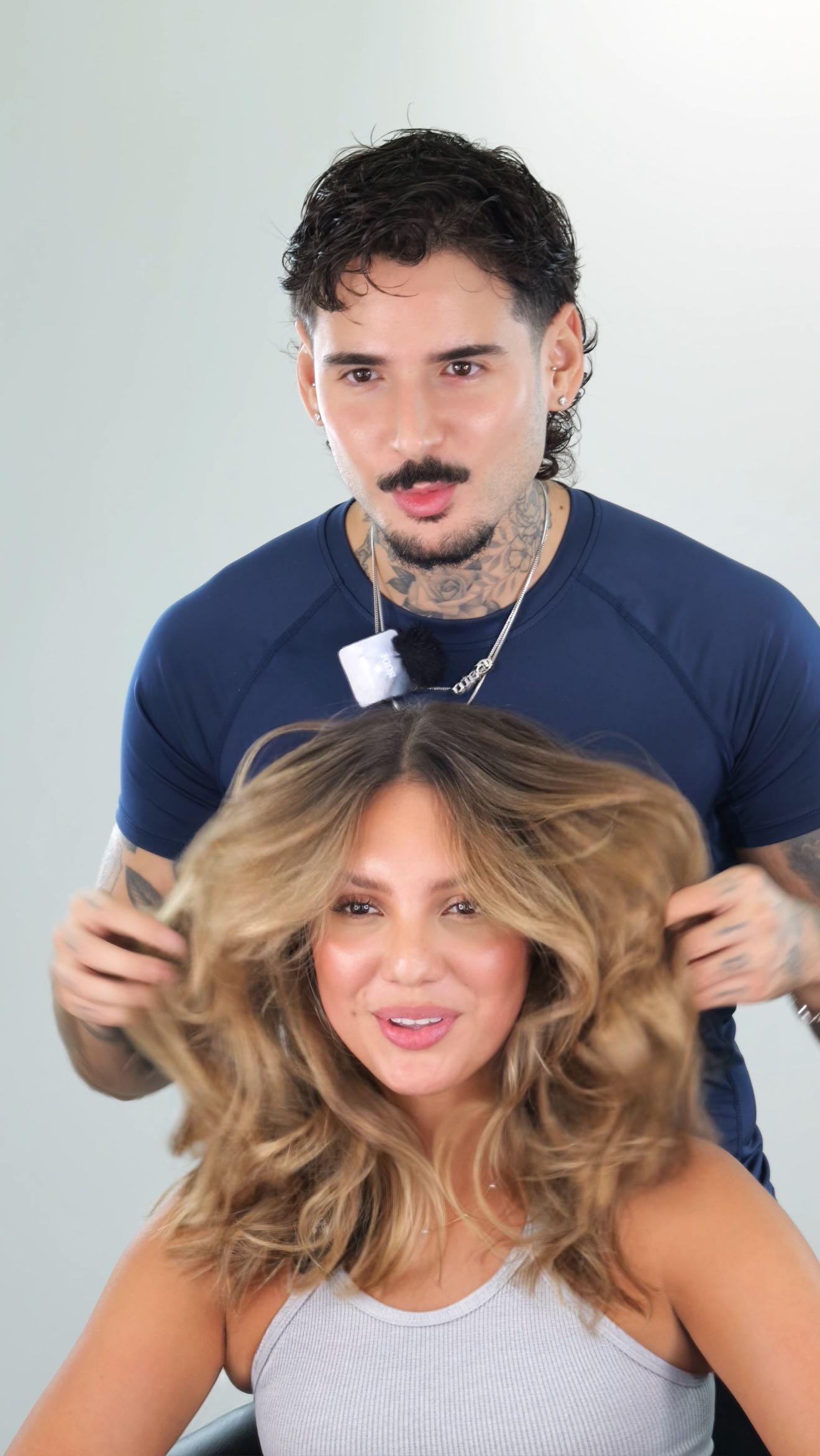 Instagram post by @migueldoeshair for Ghd Hair. Caption reads: Frizz-less shiny waves made easy 🤩....