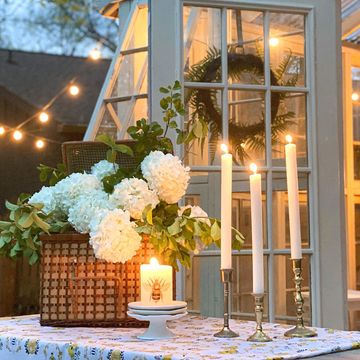 Instagram post by @sparrowhomedesign for American Farmhouse Style. Caption reads: The-dripping-wax-on-my-linens, problem is solved....