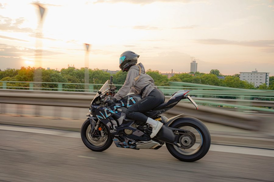 Instagram post by @nanaxyda for Cardo Systems. Caption reads: Fly by ✈️ 
_________________
📸: @virtus_pro_media....