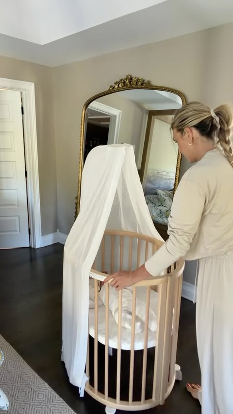 Instagram post by @dr.anika.ackerman for Stokke. Caption reads: Building baby girl’s dream crib 🤍 The Stokke®....