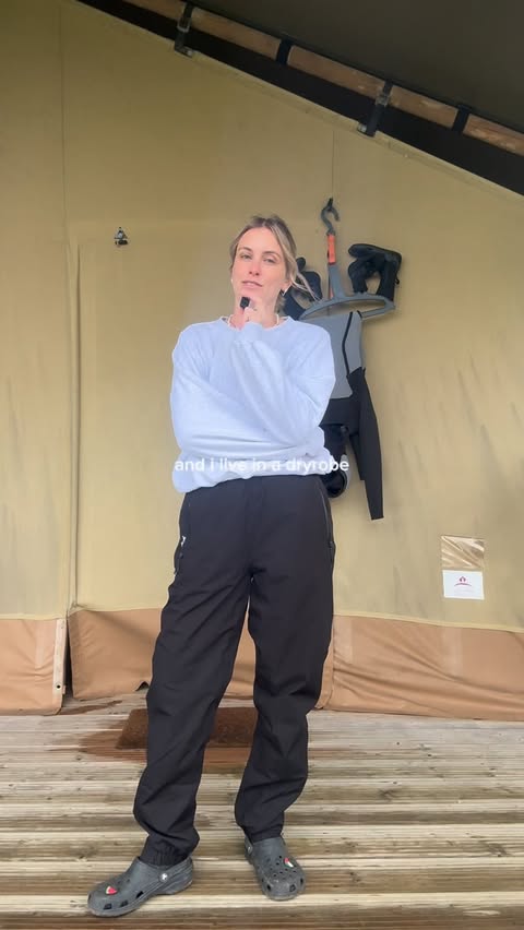 Instagram post by @sophiehellyer for dryrobe. Caption reads: [...] introduce the real survival outfit: my....