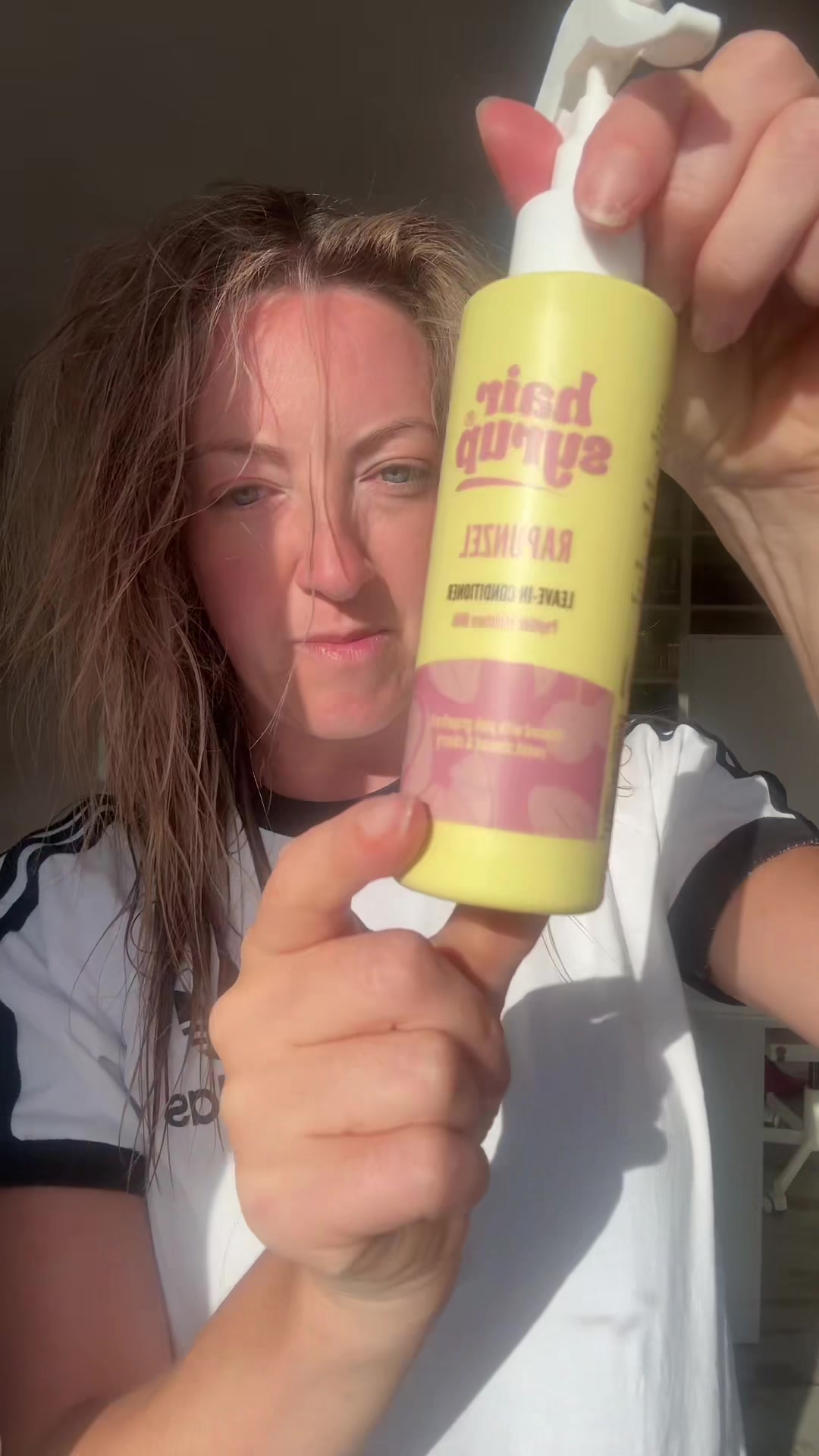 TikTok post by @irishmammylife for Hair Syrup. Caption reads: [...] for tangled damaged hair, I’m using Hair....