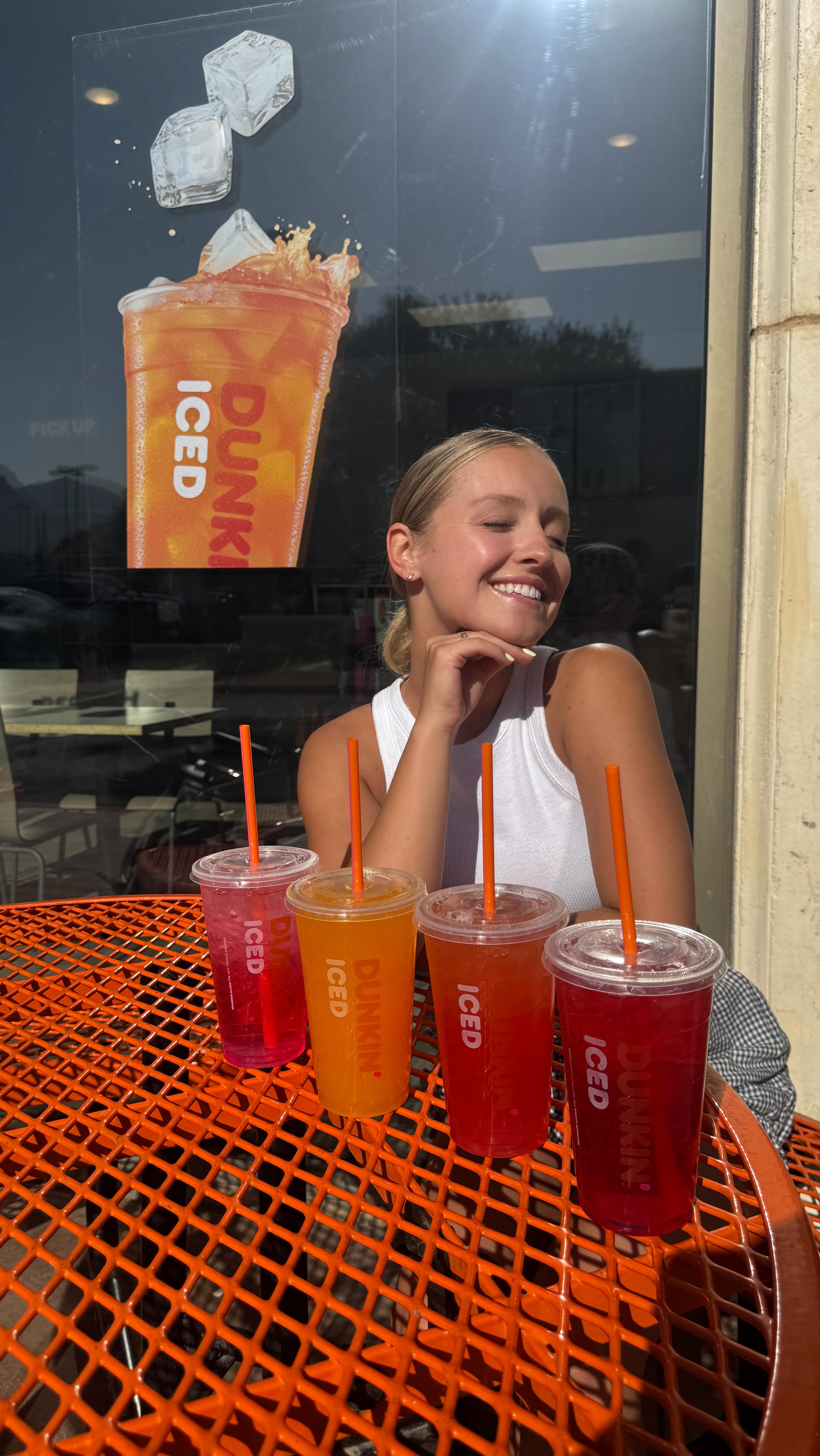 Instagram post by @daisyykent for Dunkin’. Caption reads: what you drinking this summer? I know my answer....