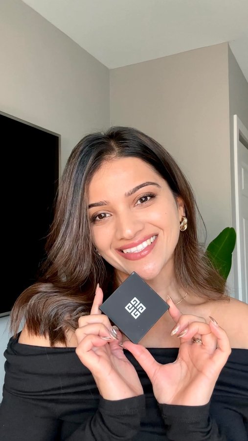 Instagram post by an influencer for Givenchy Beauty. Caption reads: [...] and skin-loving! The new @givenchybeauty....