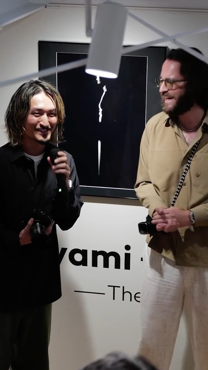 Instagram post by @ryota_0809 for Leica Camera. Caption reads: ⁣@alan_schaller and @ryota_0809 at the opening....