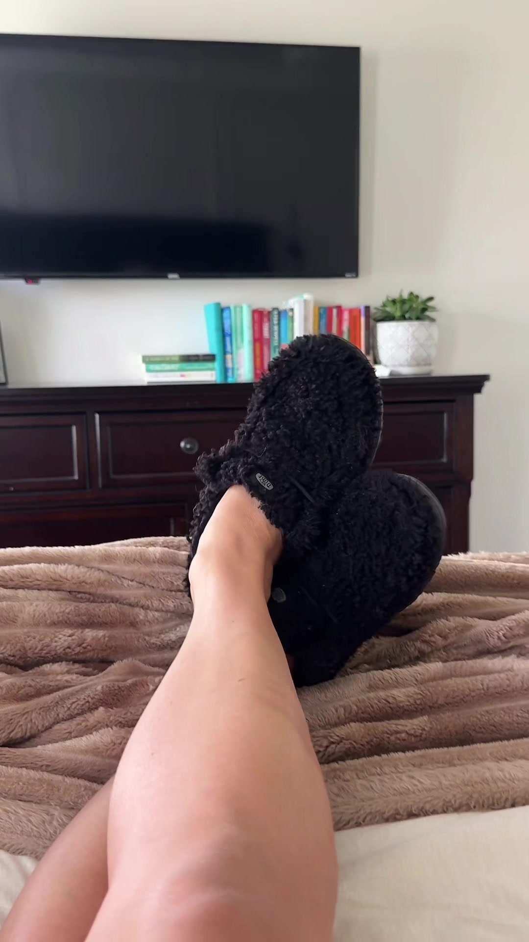 TikTok post by @kristasfinds for Hey Dude Shoes. Caption reads: Y’all are seeing that same price, right? @HeyDude....