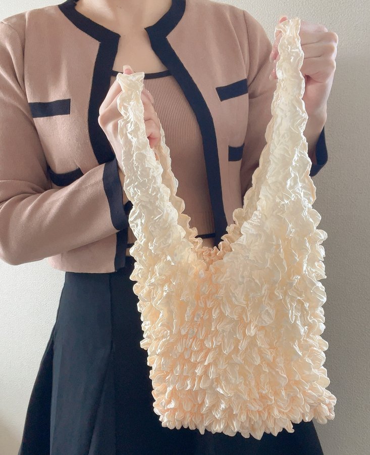 Instagram post by @junnaaa624 for Lulu.. Caption reads: .
Lulu.ショッピングバッグを使ってみました🩷
.
めっちゃ可愛くない😍？
.
伸びるから沢....