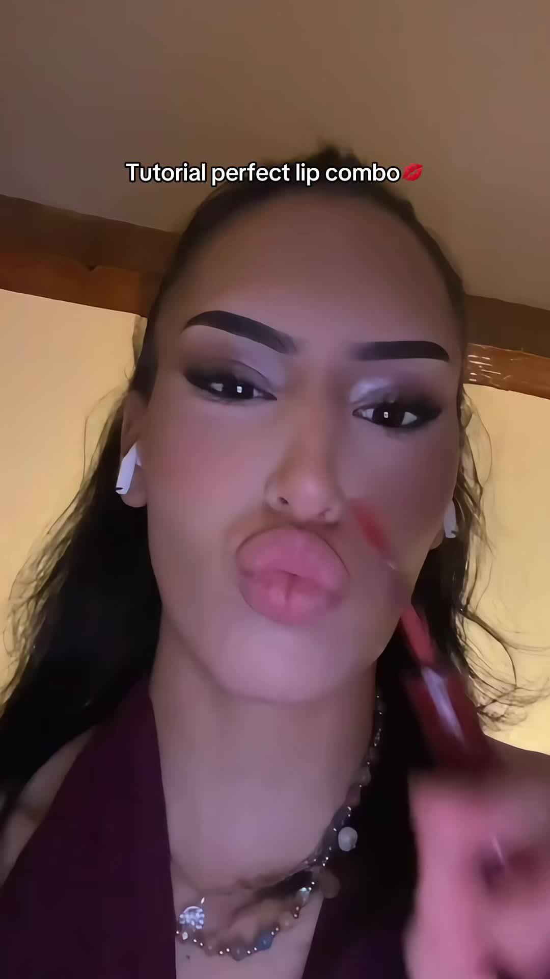 TikTok post by @assiaps for YSL Beauty. Caption reads: @YSL Beauty @NYX COSMETICS FRANCE 💋🩷....