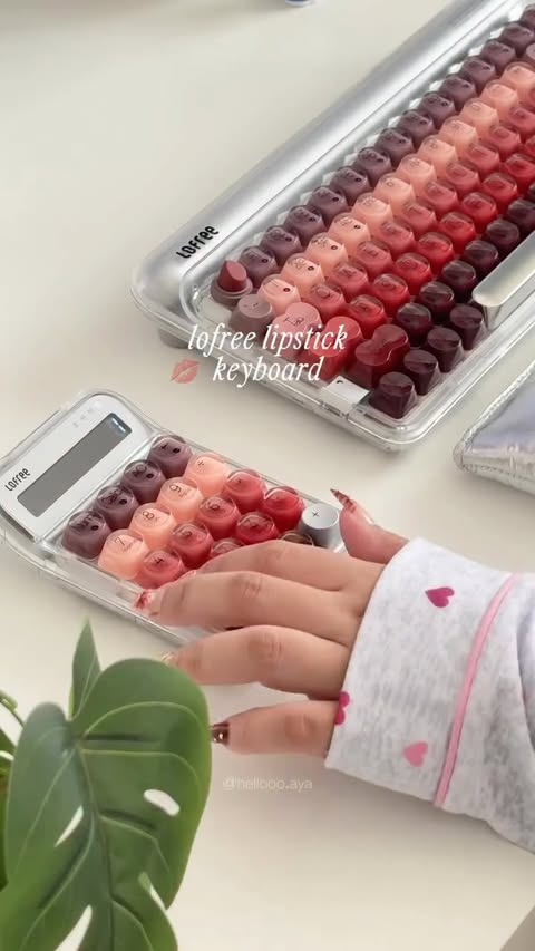 Instagram post by @hellooo.aya for LOFREE. Caption reads: ✨ lipstick keyboard?! 💋💄

the @lofree.co....