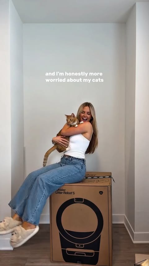 Instagram post by @faaithmaarie for Litter-Robot by Whisker. Caption reads: Moving is stressful enough, but my biggest concern....