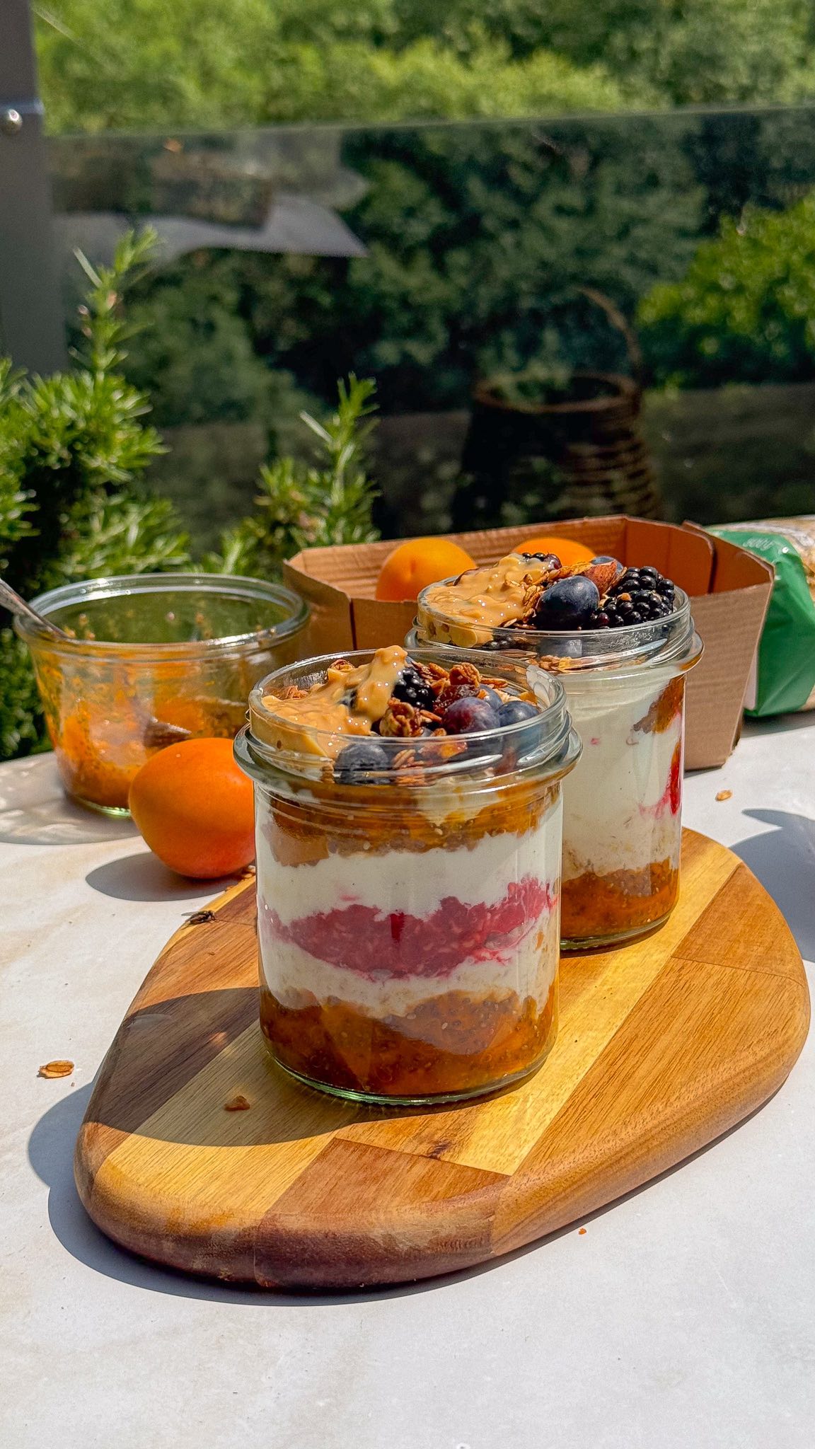 Instagram post by @marina_annen for COOP. Caption reads: Apricot Berry Overnight Oats 🫐☀️ A healthy....
